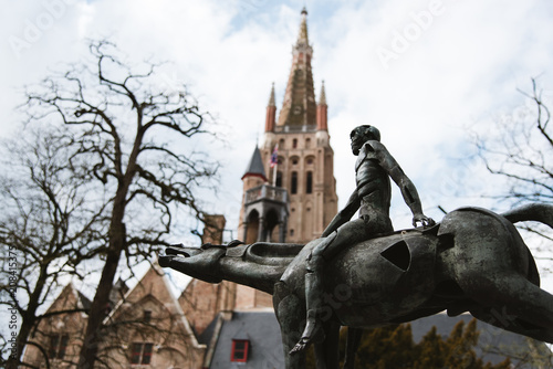 Statue and Church in Bruges, Belgium