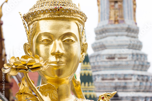 Golden Angel in Wat Pra Kaeo in Bangkok, Thailand.