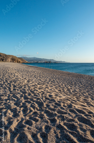 The beach of the dead with the sun and the blue sky