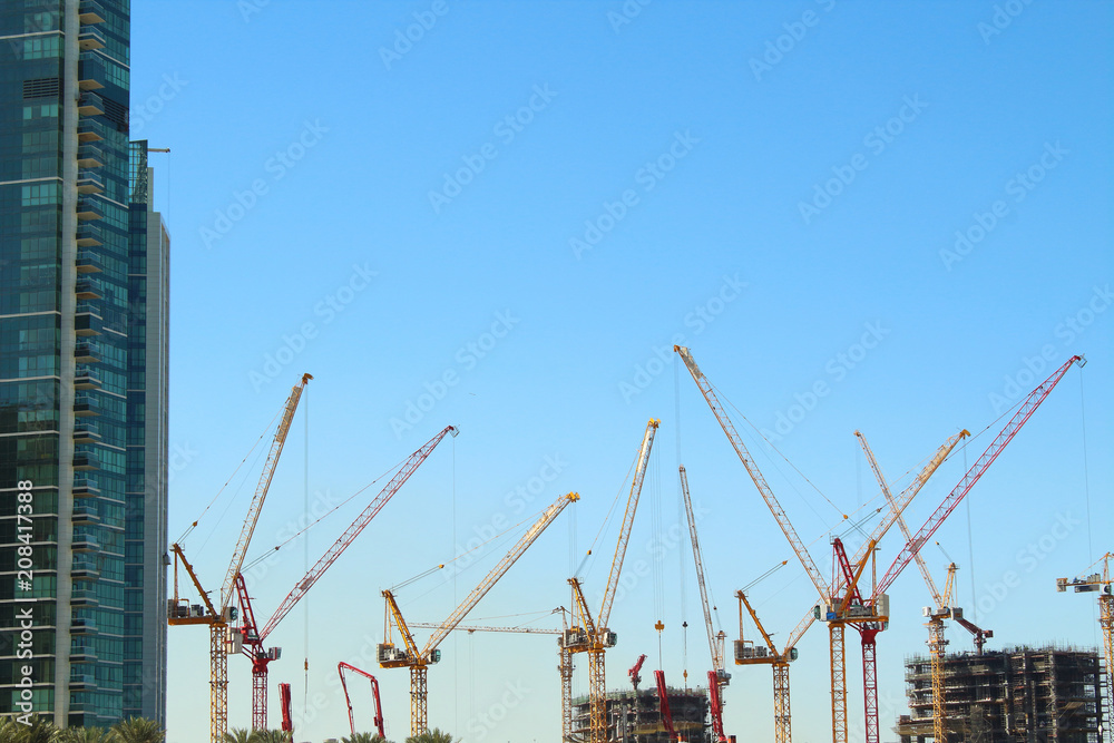 United Arab Emirates. Hoisting tower cranes. Construction of skyscrapers. Spring, March, 2018.