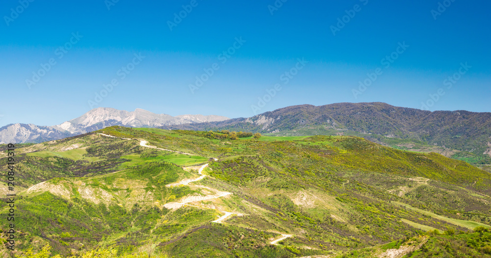 Beautiful mountain landscape with a view of the serpentine road Beautiful mountain landscape with a view of the serpentine road