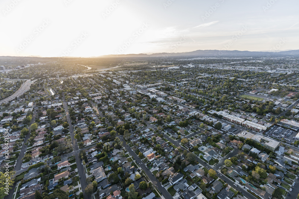 Aerial view of setting sun over Van Nuys in the San Fernando Valley in Los Angeles California.