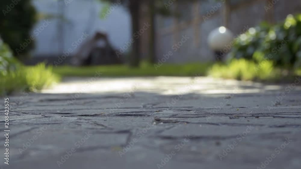 Legs of little girl on stone path Legs of little girl on stone path