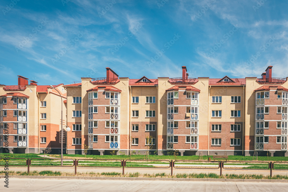 Residential buildings with balconies in the city, urban development of apartment houses. Ostrovets, Belarus
