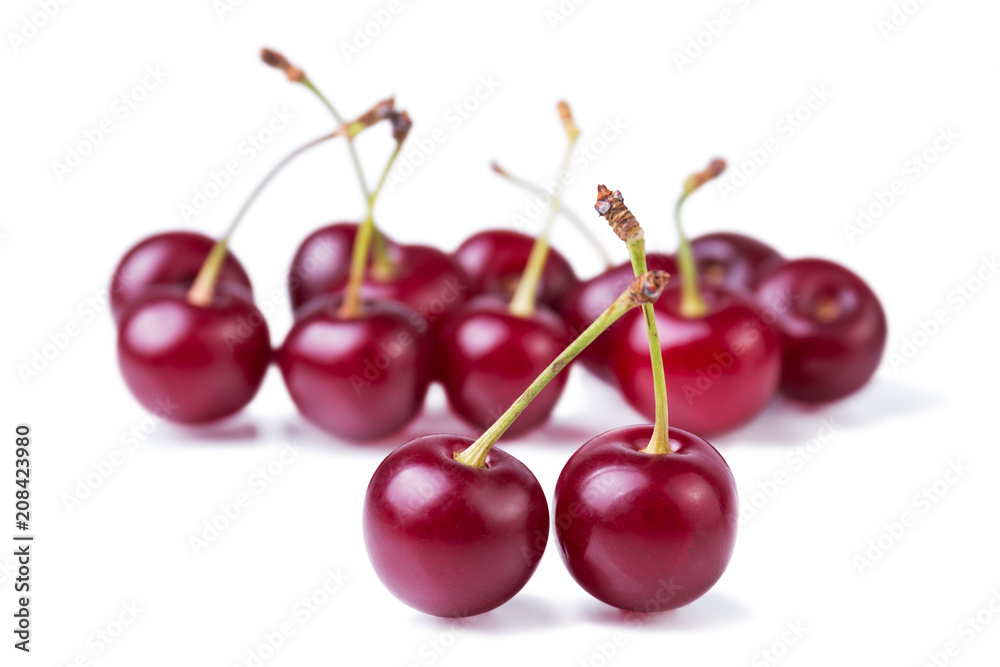 Heap of cherries, red ripe berries isolated on white background Heap of cherries, red ripe berries isolated on white background