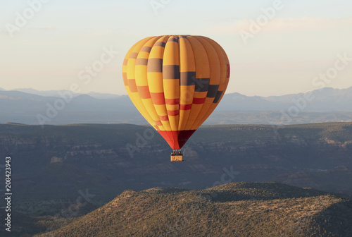 A Hot Air Balloon Soars Near Sedona, Arizona © Derrick Neill