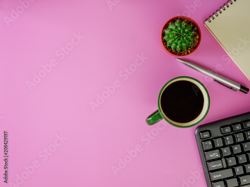 Flat lay,top view pink office desk with copy space