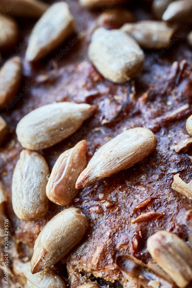 Close up picture of a whole wheat bread crust with sunflower seeds, selective focus. Close up picture of a whole wheat bread crust with sunflower seeds, selective focus.