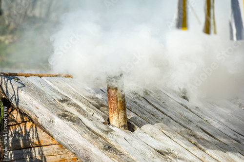 Steam exhaust of a cabin in the alps