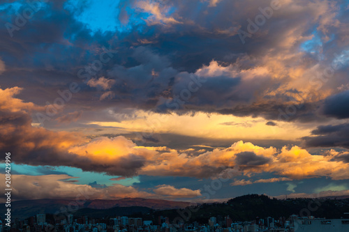 Spectacular sky with clouds of various colors  over the city of Quito