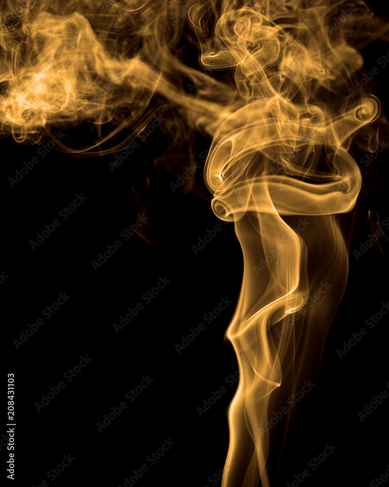 Smoke rising against black background Smoke rising against black background