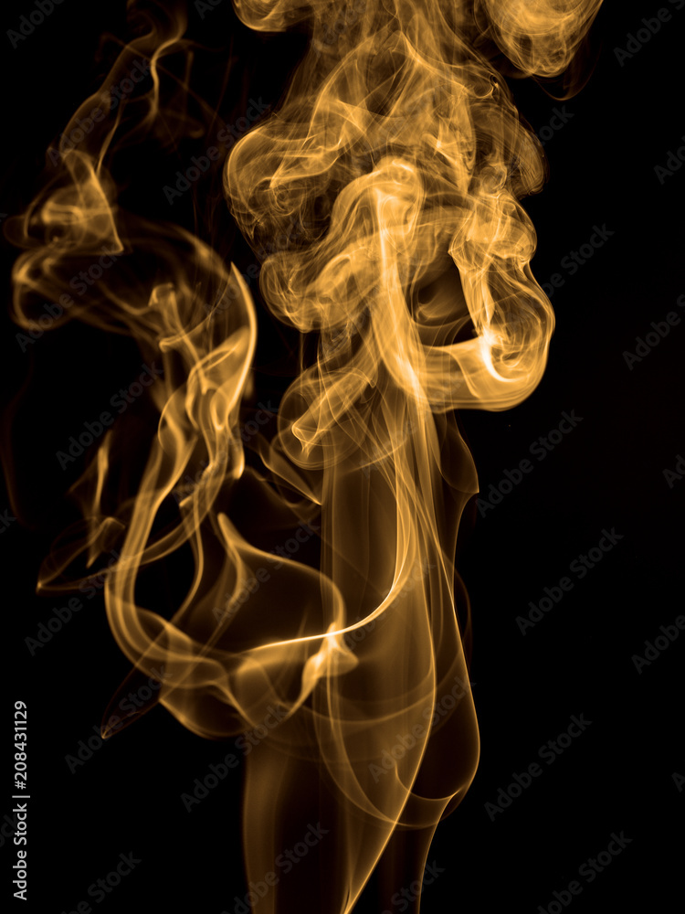 Smoke rising against black background Smoke rising against black background
