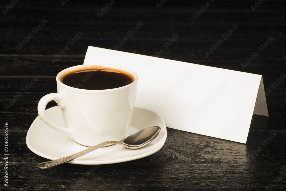 A cup of coffee on a background of a placard with room for text
