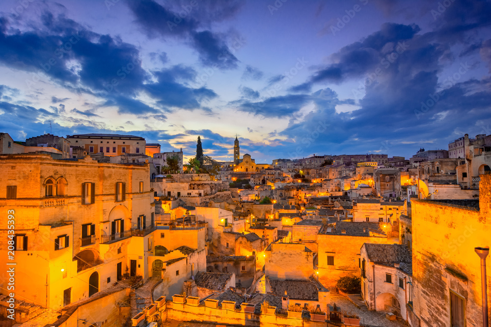 Matera, Basilicata, Italy: Night view of the old town - Sassi di Matera, European Capital of Culture, at dawn
