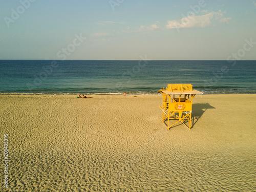 Punta Zicatela es parte de Puerto Escondido las mañanas en la playa son lo mejor junto a la estructura de salvavidas photo