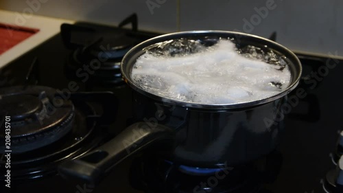 chikcken eggs are cooked on the stove photo