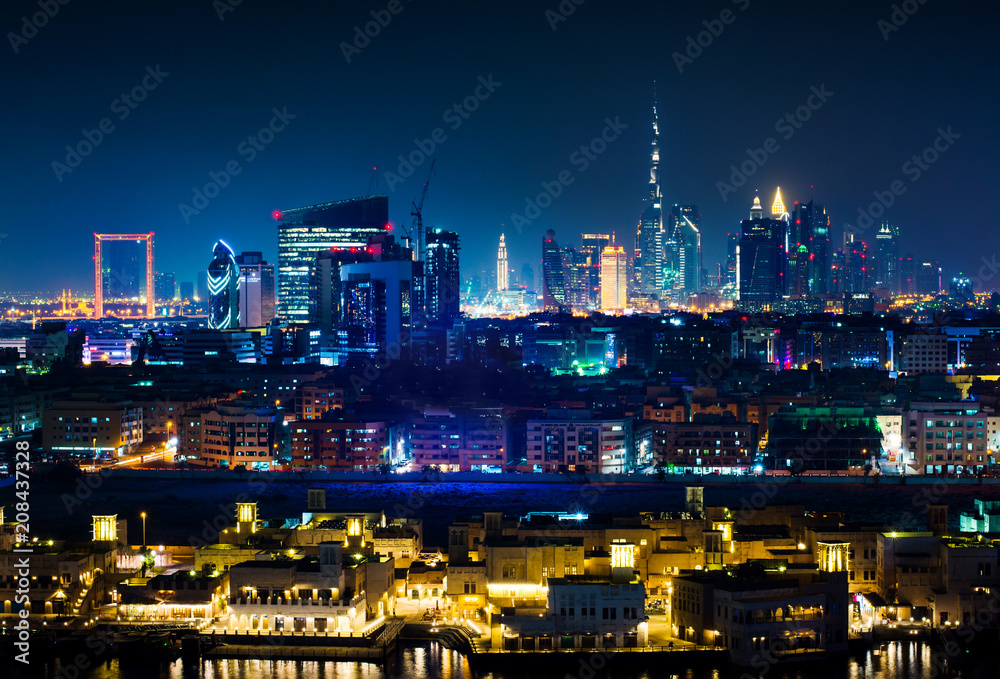 Dubai skyline and modern cityscape view at night