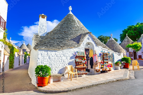Alberobello, Puglia, Italy: Typical houses built with dry stone walls and conical roofs, in a beautiful day, Apulia
