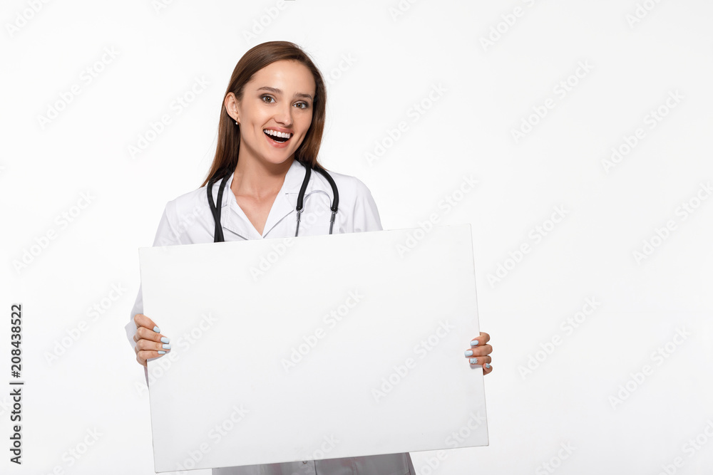 doctor in white uniform holding blank board doctor in white uniform holding blank board