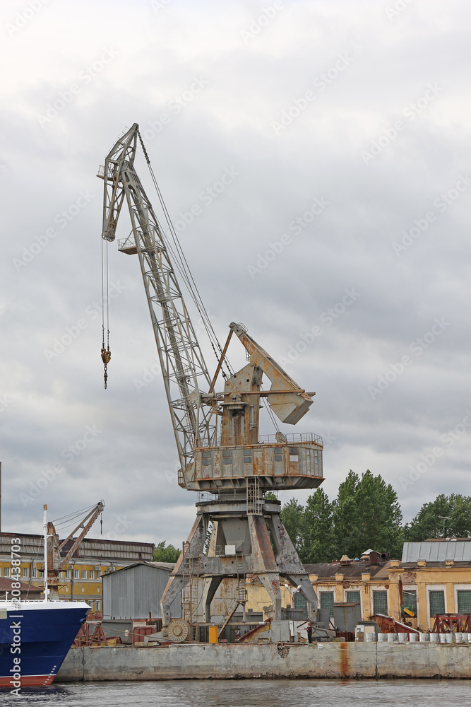 high rusty port crane