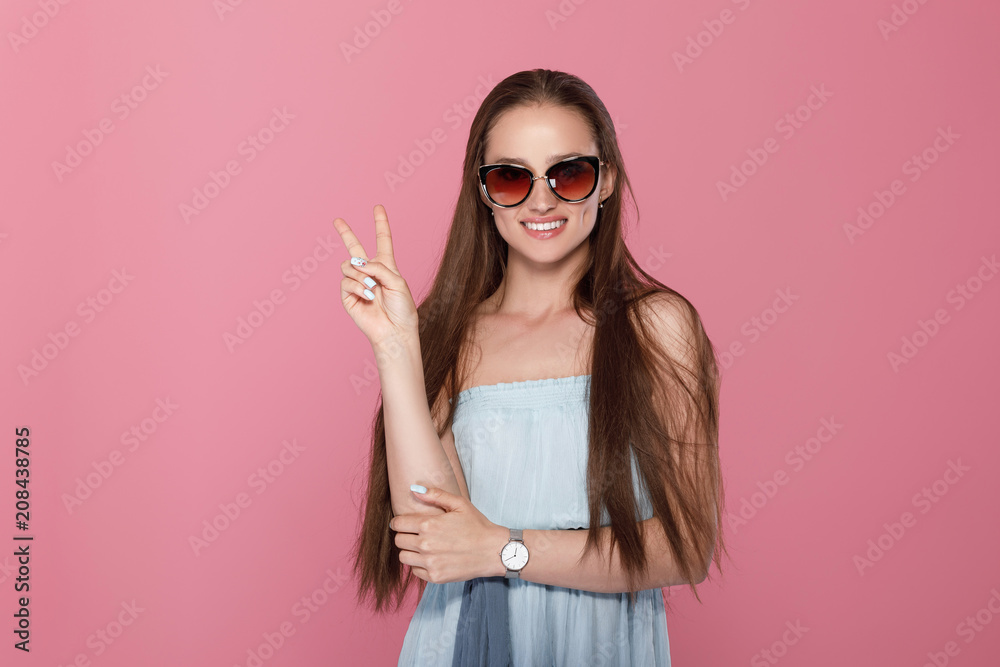 woman showing two fingers or victory gesture woman showing two fingers or victory gesture