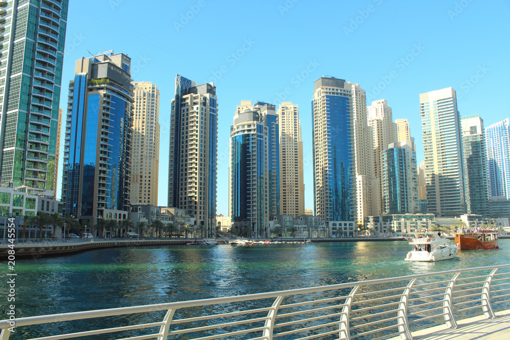 Fototapeta premium United Arab Emirates. Dubai Marina Canal. Beautiful panorama of the city. Background. Dubai, Spring, March, 2018.