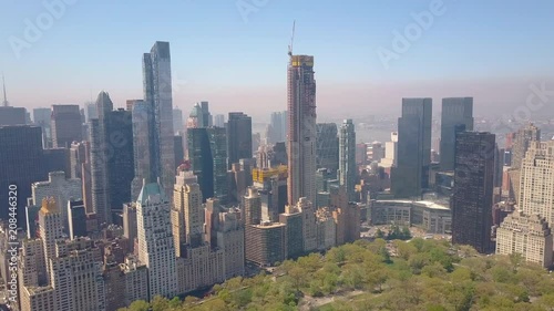 Aerial view of Central Park, New York, USA, Skyscrapers on background. Luxury residential buildings.