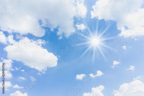 Sun with blue sky background.