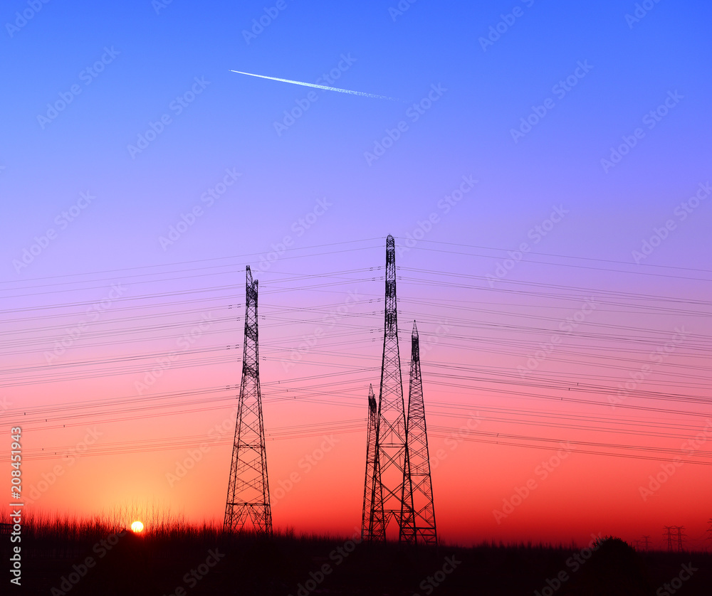 High piezoelectric towers, in the setting sun High piezoelectric towers, in the setting sun