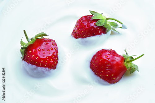 Strawberries with cream close-up.