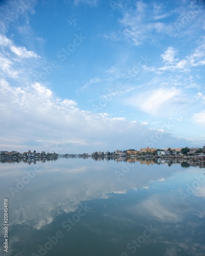Treasure Island, Florida, Boca Ciega Bay, Clouds, Blue sky, water reflections © Betsy Lewis Hohe