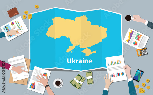 ukraine economy country growth nation team discuss with fold maps view from top
