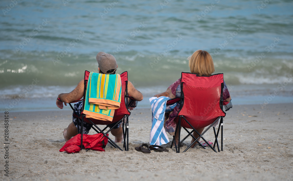 unknown couple gets to relax while on vacation unknown couple gets to relax while on vacation