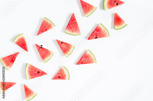 Watermelon pattern. Red watermelon on white background. Summer concept. Flat lay, top view, copy space