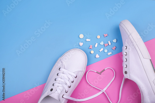 Fashion Trendy White Sneakers with Heart. Pastel Pink Blue Color. Candies. Valentines day concept