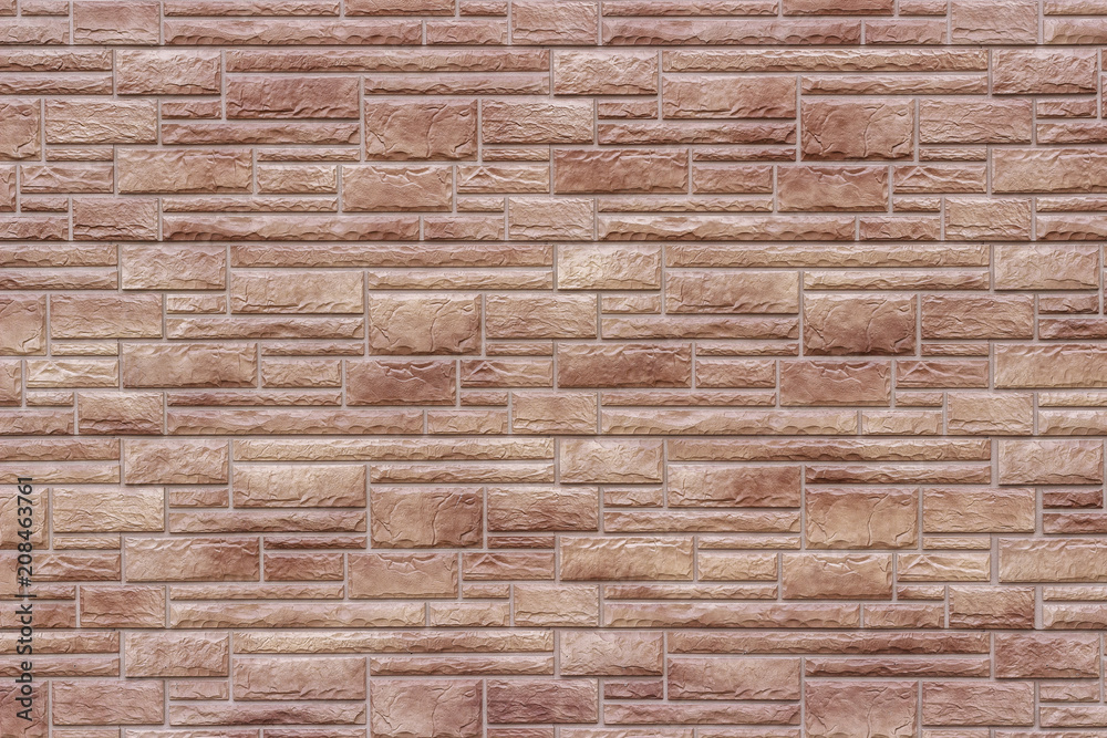 Decorative brown brick wall as background or texture. Decorative brown brick wall as background or texture.