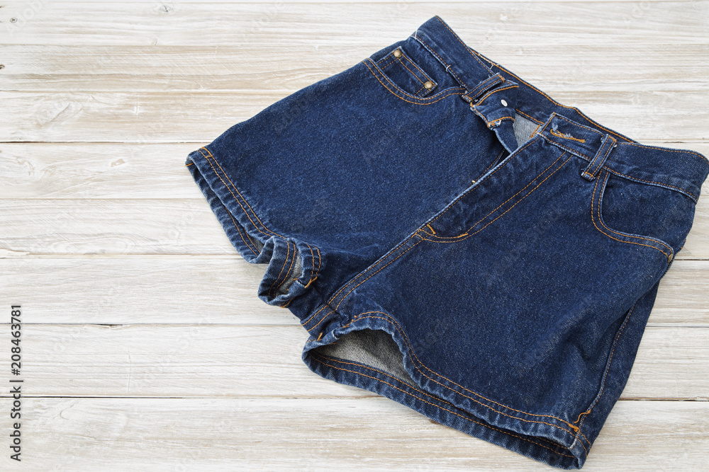 Short Denim on rustic white wooden Table Short Denim on rustic white wooden Table