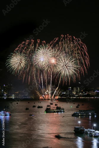 red firework at Pattya beach photo