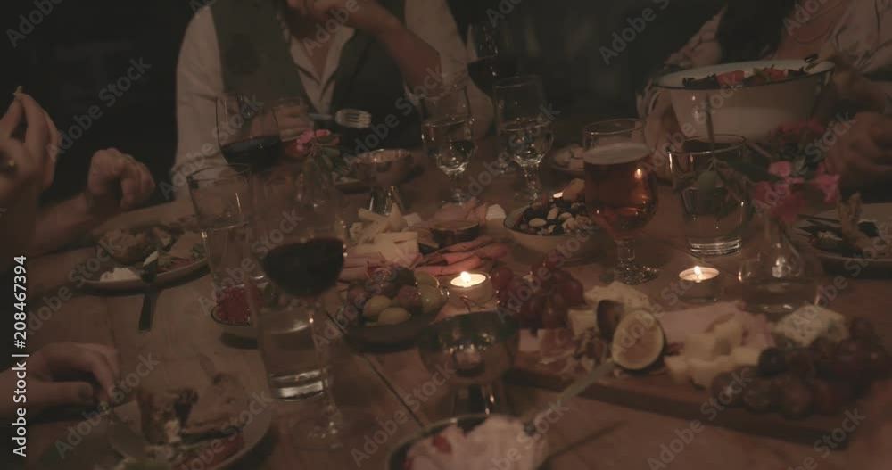 Young friends and couples having dinner party with mediterranean food