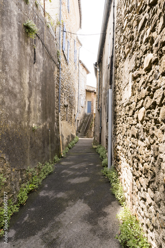 smale lane in a old france city with stone houses