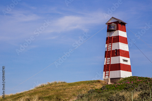 Lighthouse on seaside photo