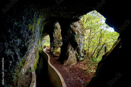 Cave windows on levada do Furado, Madeira, Portugal photo