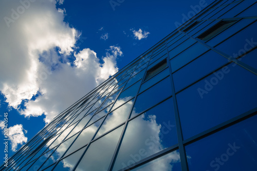 Wallpaper Mural Abstract modern office building. Reflections of the sky in the glass surface. Torontodigital.ca