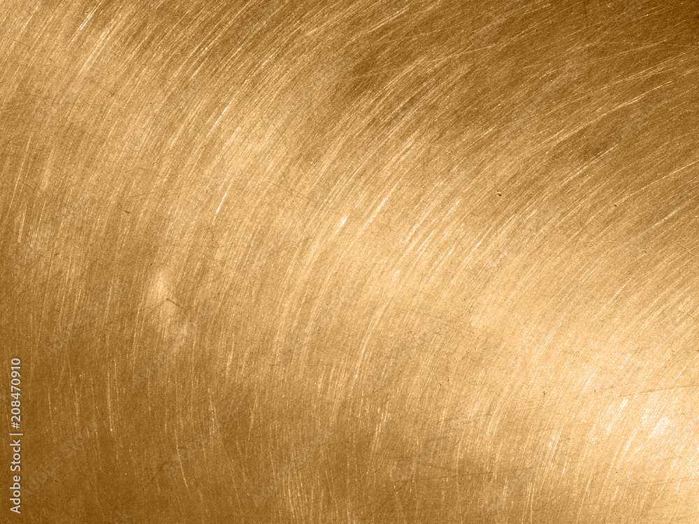 Gold metal texture with circular scratches. Stock Photo Adobe Stock