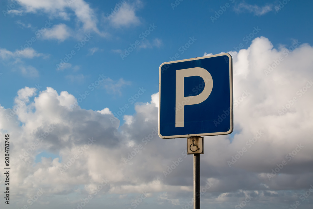 Parking traffic sign and a sky with clouds Parking traffic sign and a sky with clouds