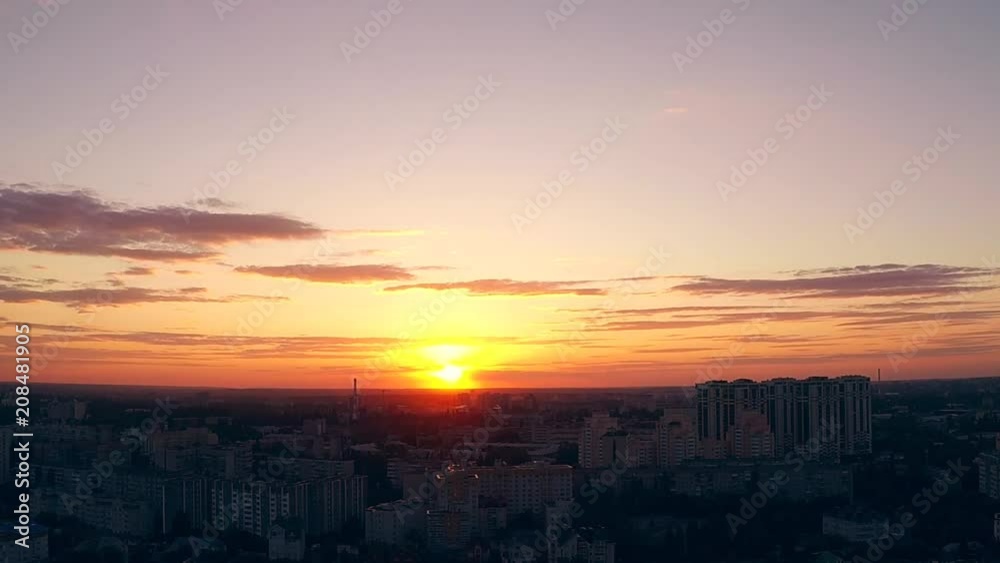 Aerial view from rooftop to sunset over city panorama, toned Aerial view from rooftop to sunset over city panorama, toned