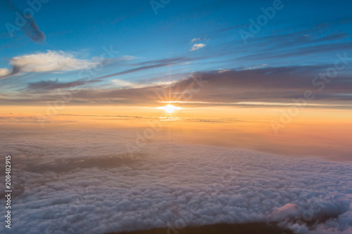 Beautiful sunrise seen from the top of the Mount Fuji, Japan. © nonchanon