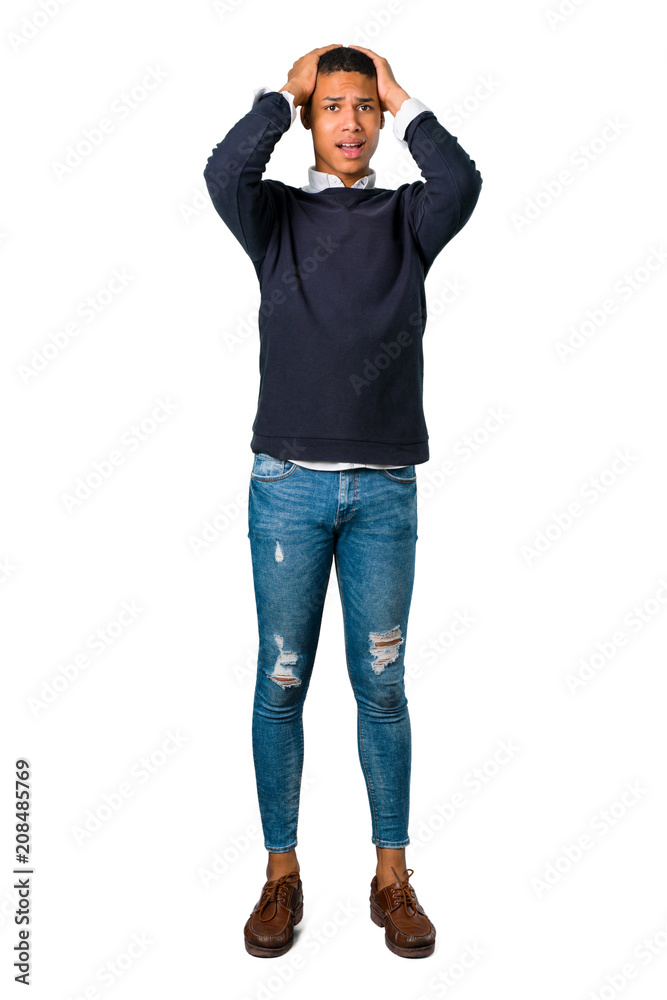 Young african american man annoyed angry in furious gesture. Negative expression on isolated white background Young african american man annoyed angry in furious gesture. Negative expression on isolated white background