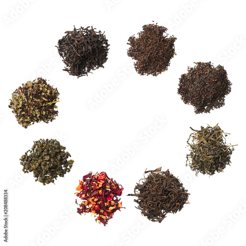 Heap of dried herbal tea leaves isolated on white. Top view.