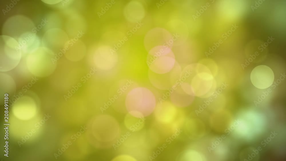 Moving yellow, gold, greenish glitter lights, defocused light reflections loopable yellow - gold bokeh background Moving yellow, gold, greenish glitter lights, defocused light reflections loopable yellow - gold bokeh background